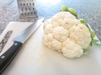 cauliflower rice recipe cauliflower on cutting board