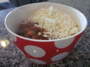 cauliflower rice recipe in a bowl with chili